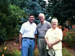 In 2000 Marvin and Emilie Snyder visited with Dennis Groh (left) in his Michigan garden