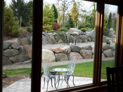 The view of the conifer garden from inside the house